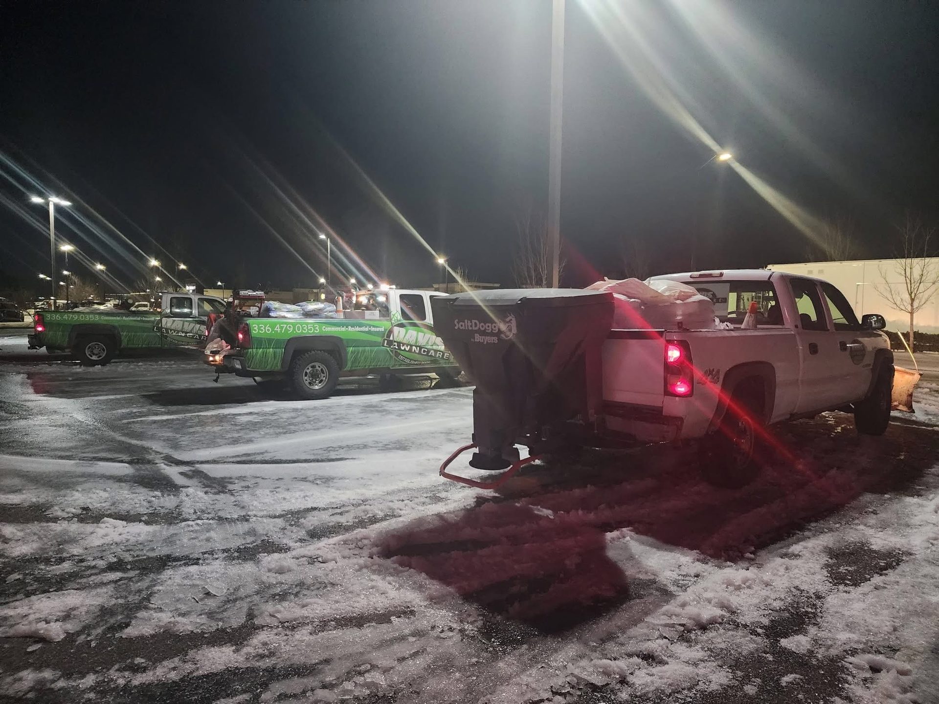 Davis Lawn Care branded trucks equipped for winter service